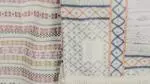 Overlapping different patterned textile pieces