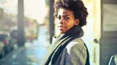headshot of a woman outside